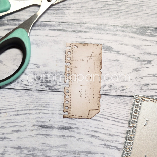 Gummiapan - Die - Papirstykke med foldet hj�rne